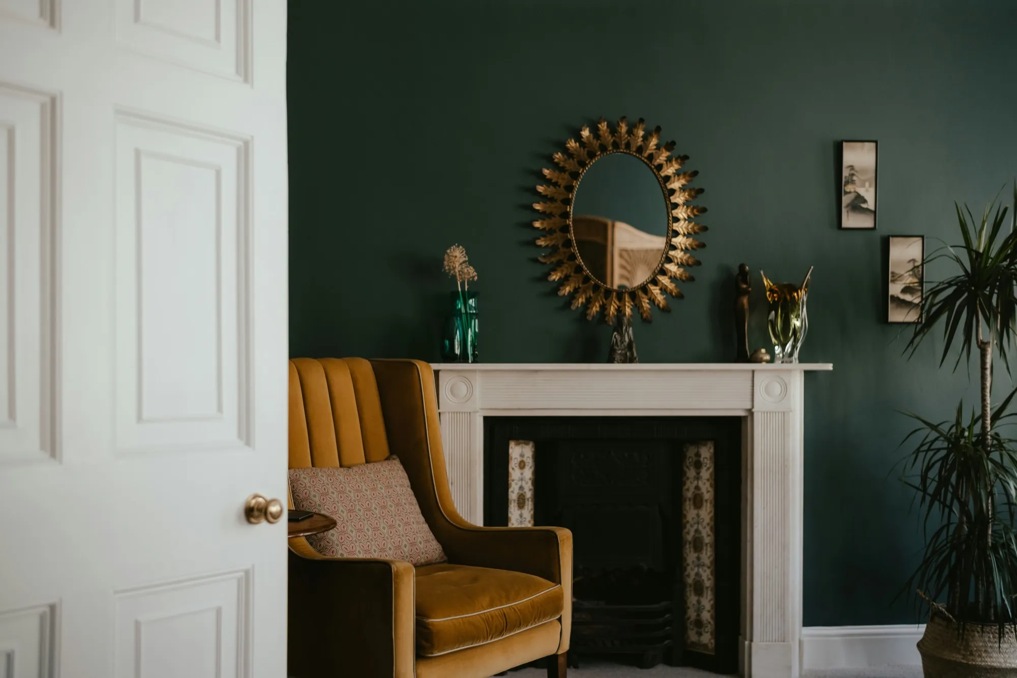Living room finished in a deep green